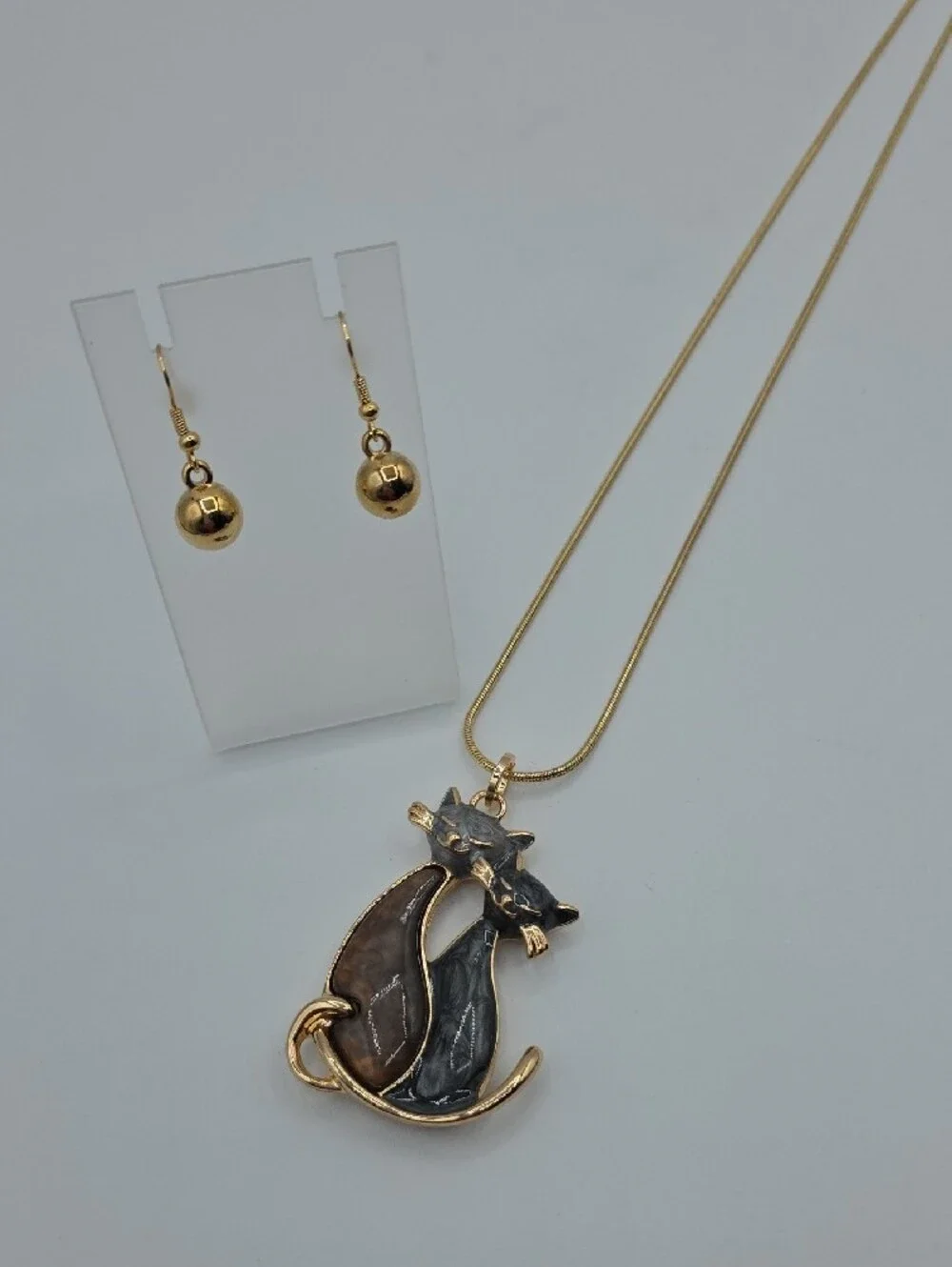 Dual Cat Pendant Necklace with Brown & Black Enamel Cats And Golden Earrings